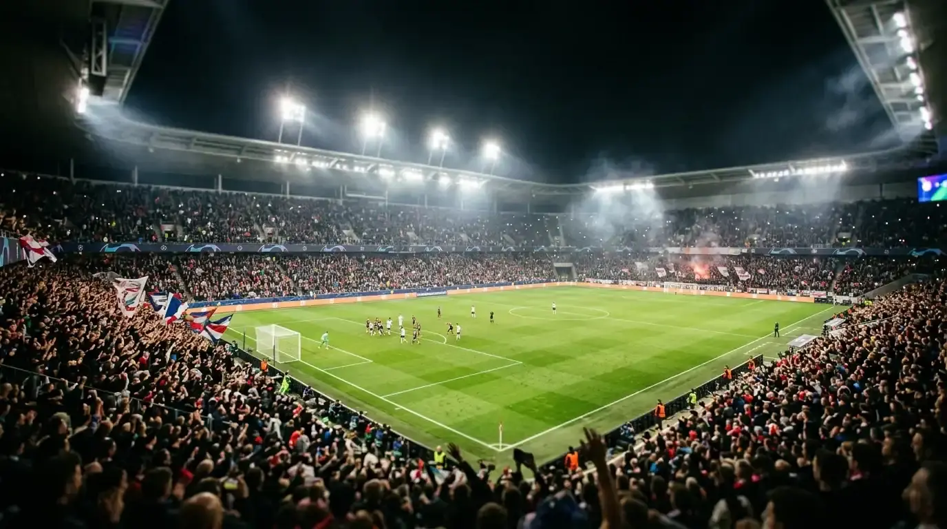 Estadio de fútbol de noche con las gradas llenas y focos encendidos durante un partido del Mundial 2026